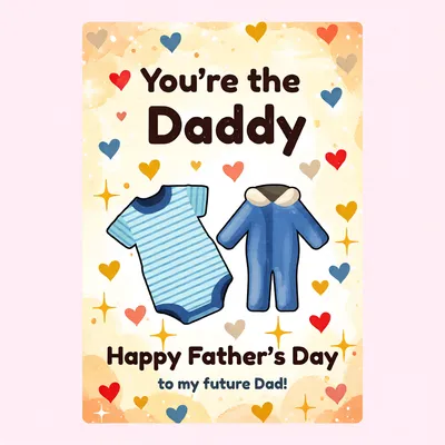 Greeting card with blue baby clothes and hearts reading You're the Daddy Happy Father's Day to my future Dad